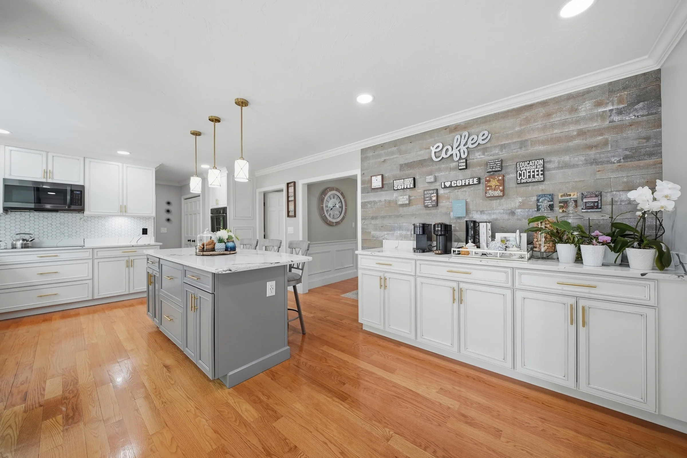 Real estate photography of a bright white kitchen in Salem, NH